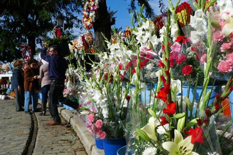 Con flores al Más Allá